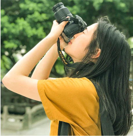 Person taking a photograph